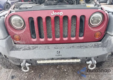 2011 Jeep Wrangler Unlimited Sahara z USA, uszkodzony, nr VIN 1J4BA5H11BL577325